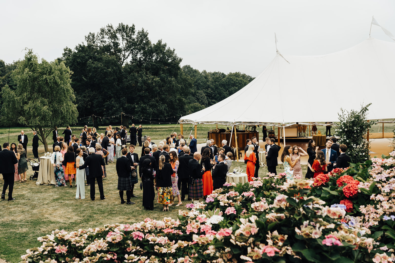 Lora & Dave's Garden Sperry Tent Wedding drinks reception, by Natalie Hewitt & Joseph Benjamin Marquees Images by Rebecca Carpenter Photography