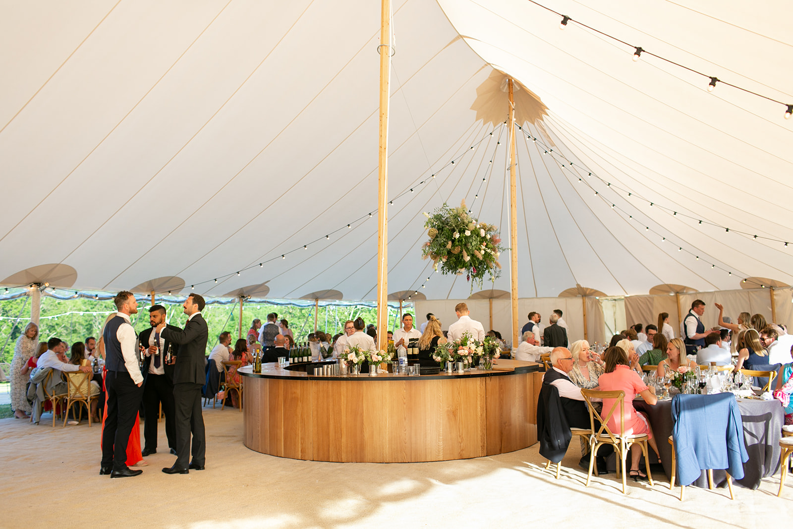 The Sperry Tent interior for Suzie & Charlie's Wedding Reception complete with round bar