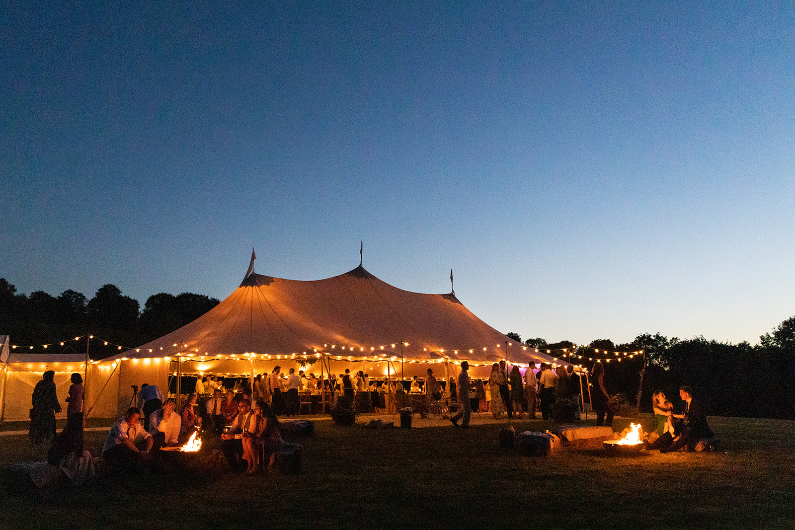 The Golden Glow of Suzie & Charlie's Sperry Tent Exterior 